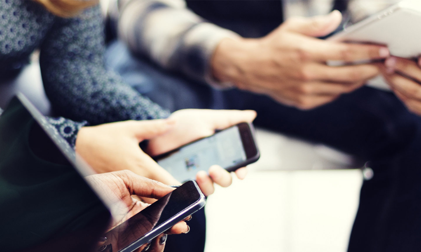 people holding phones